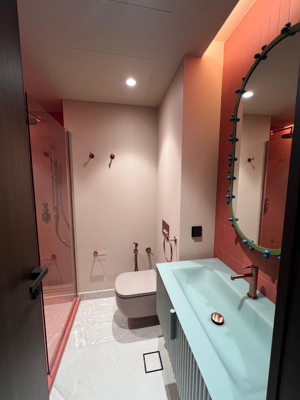 Coral-tiled bathroom with walk-in shower — apartment, Downtown Dubai